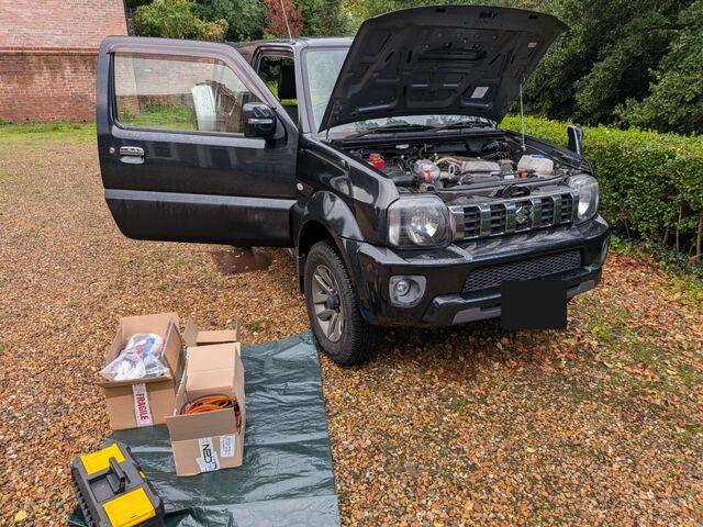 The Jimny ready to start, bonnet up