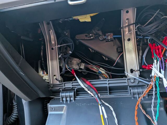 Behind the glovebox