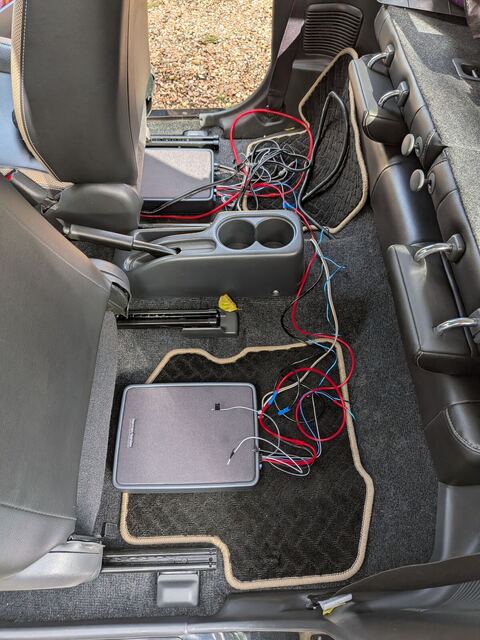 Sub fitted under the seat