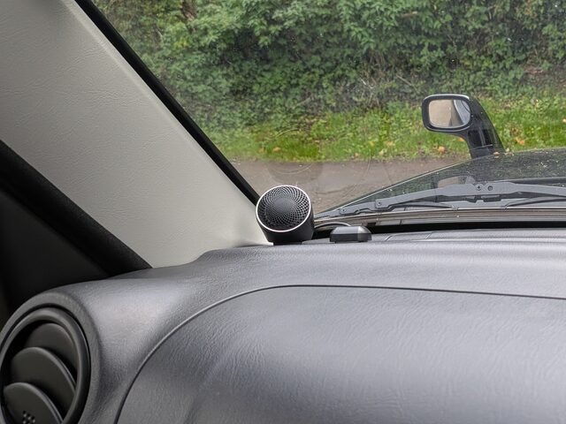 Passenger-side tweeter on the dash at the base of the A-pillar