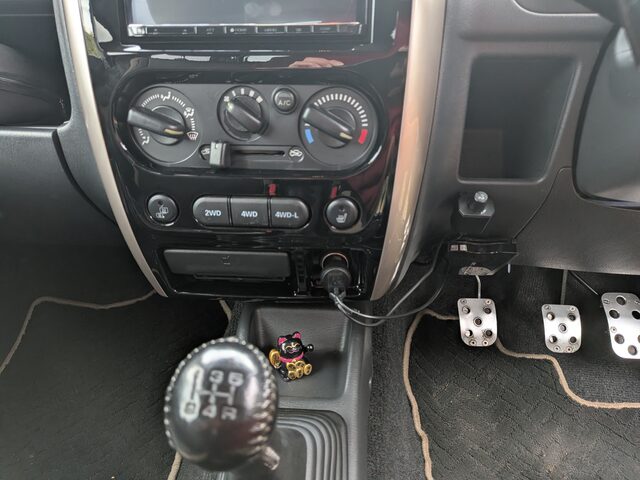 URC.1 remote under the dash, next to the centre stack