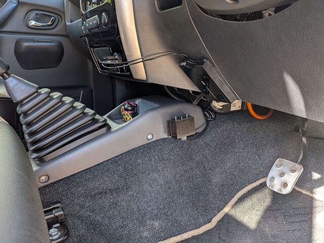 URC.3 remote on the side of the centre console