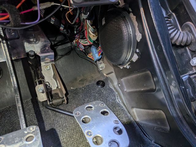 MW4 fitted in the driver-side kick panel